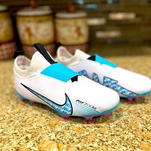 Youth soccer cleats. Size 3. Brand new never worn. No laces slide one.